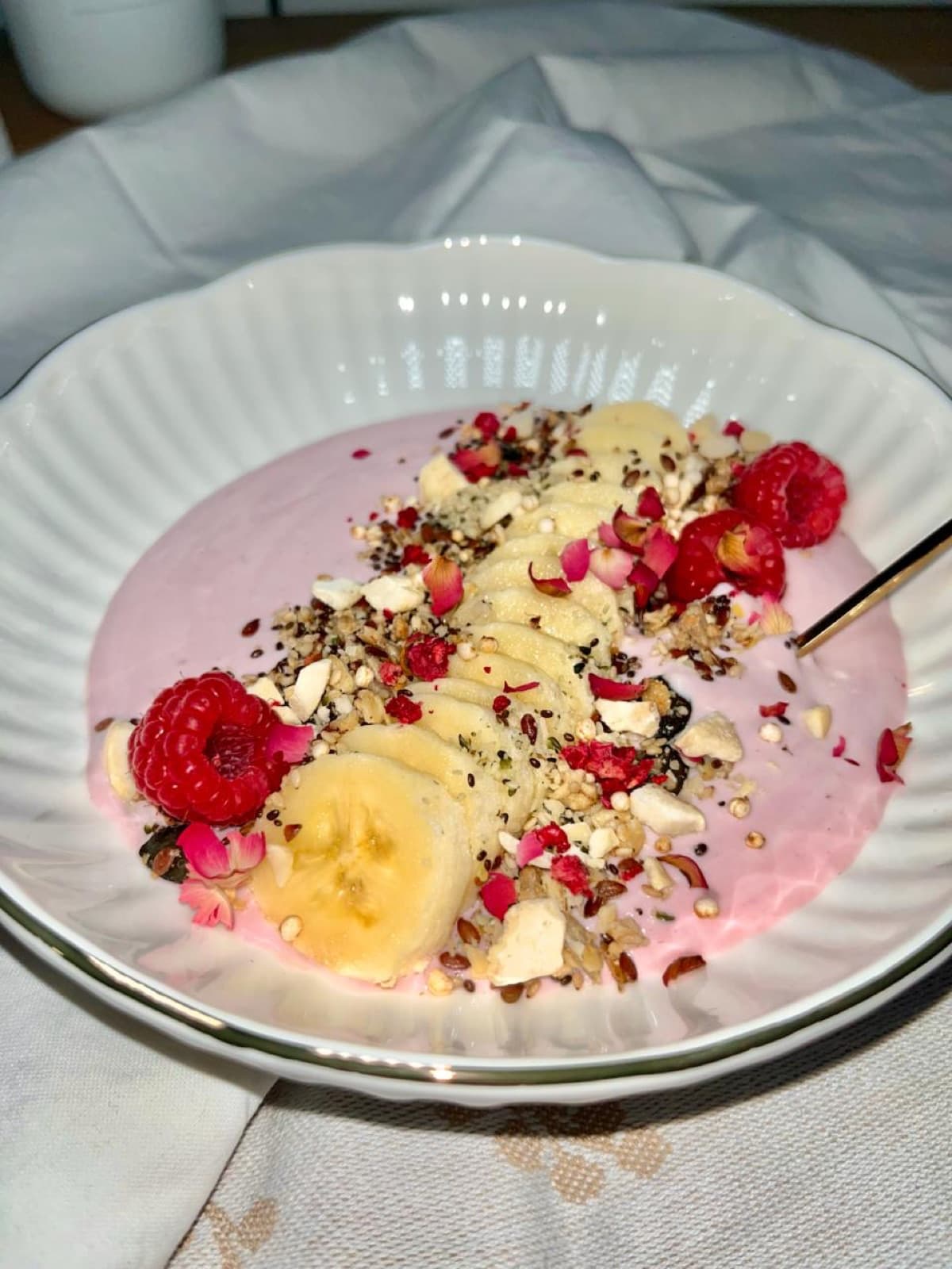 Nourishing vegan smoothie bowl with fruit and granola